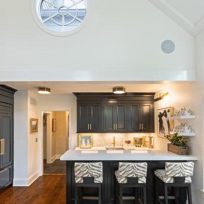 addition wet bar vaulted ceiling great room round window